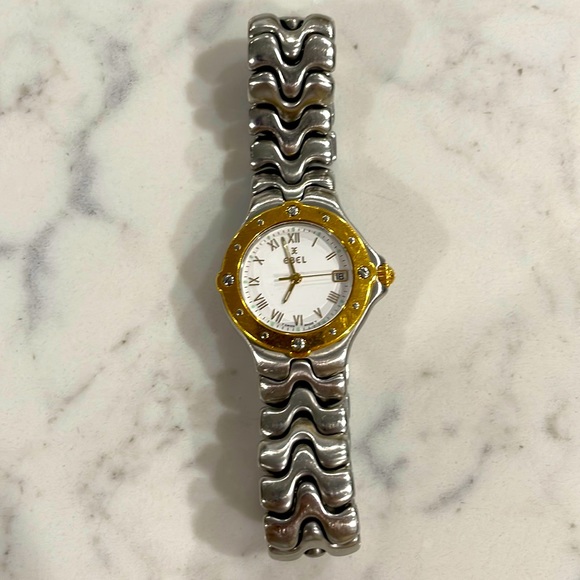 Ebel women’s Sportwave 18KT gold with SS watch